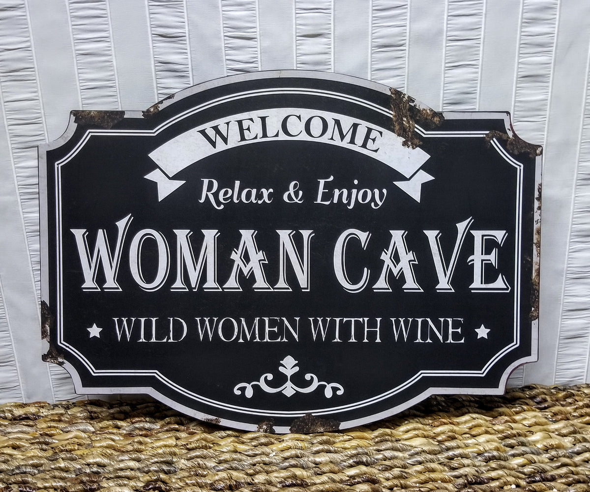Woman Cave Signs