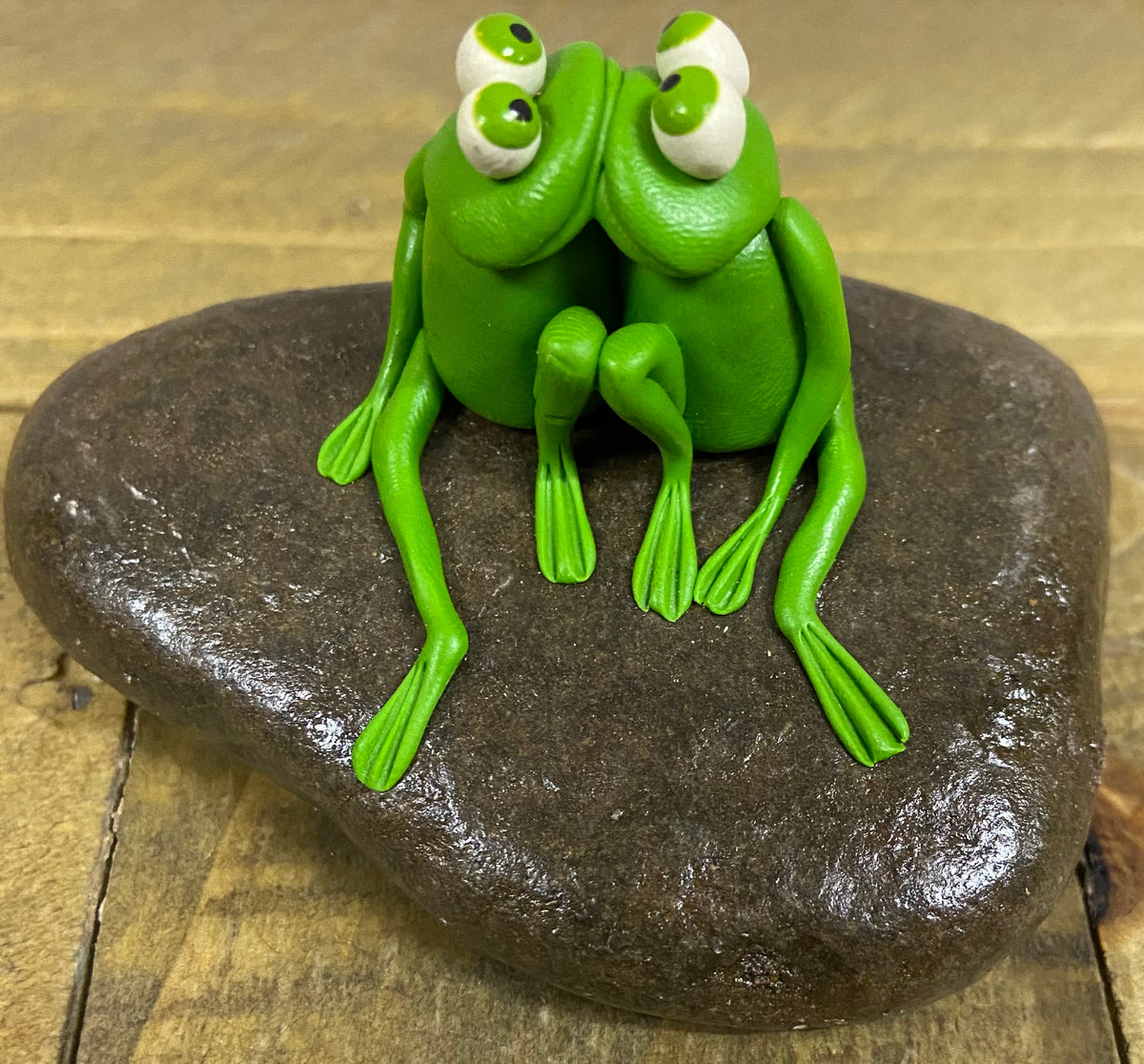 “Kissing” Frogs on Rock