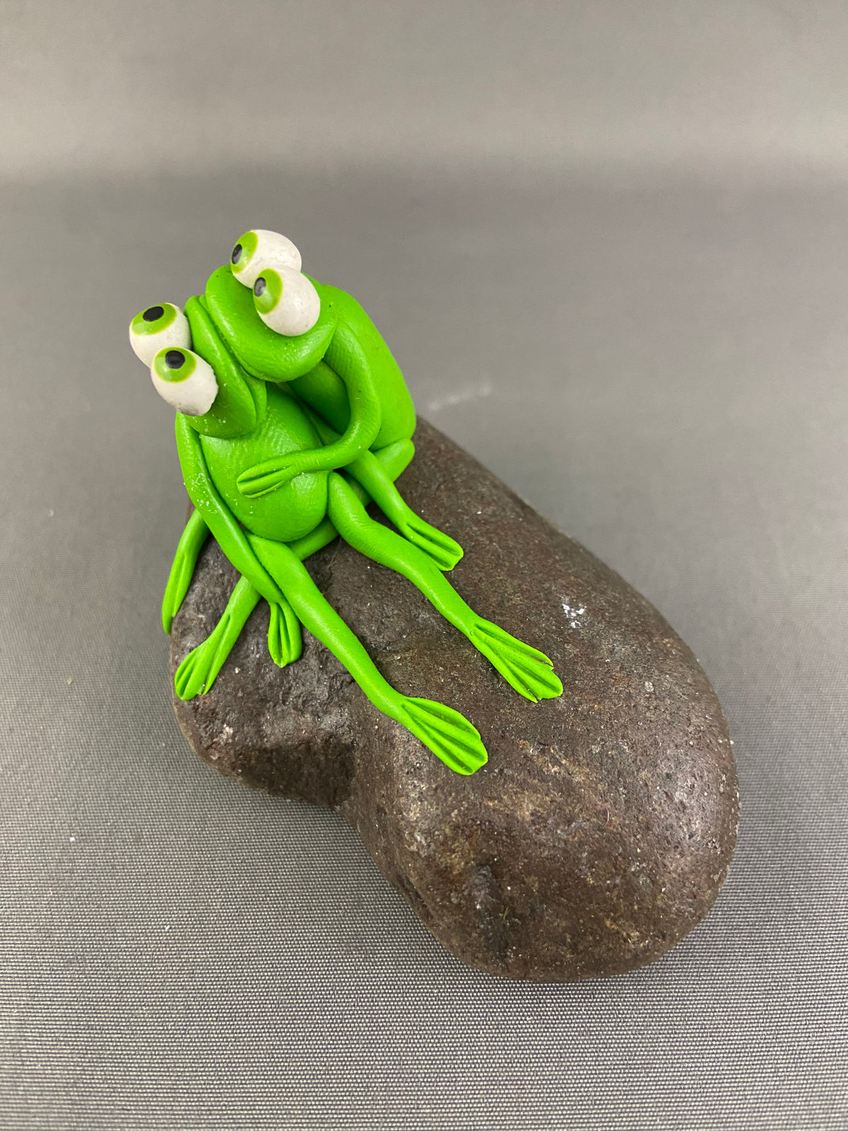 “Lap Kissing” Frogs on Rocks